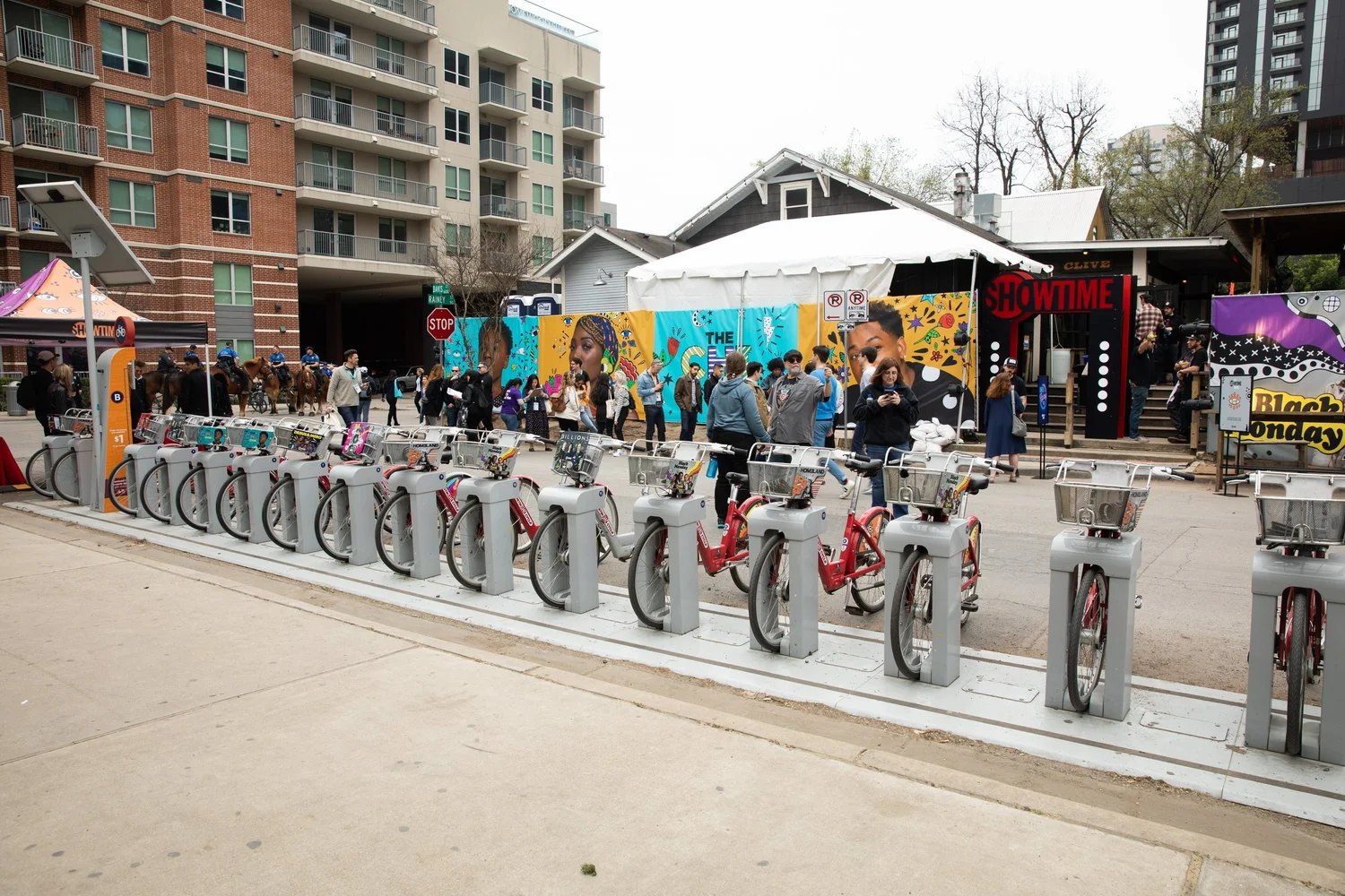 ShowCycle: branded bikes carrying the identity around Austin instead of waiting for Austin to walk past it